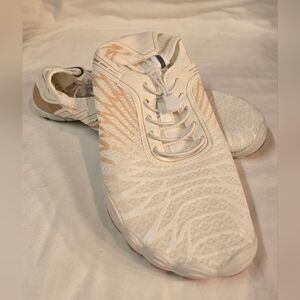 White and Tan Athletic Shoes